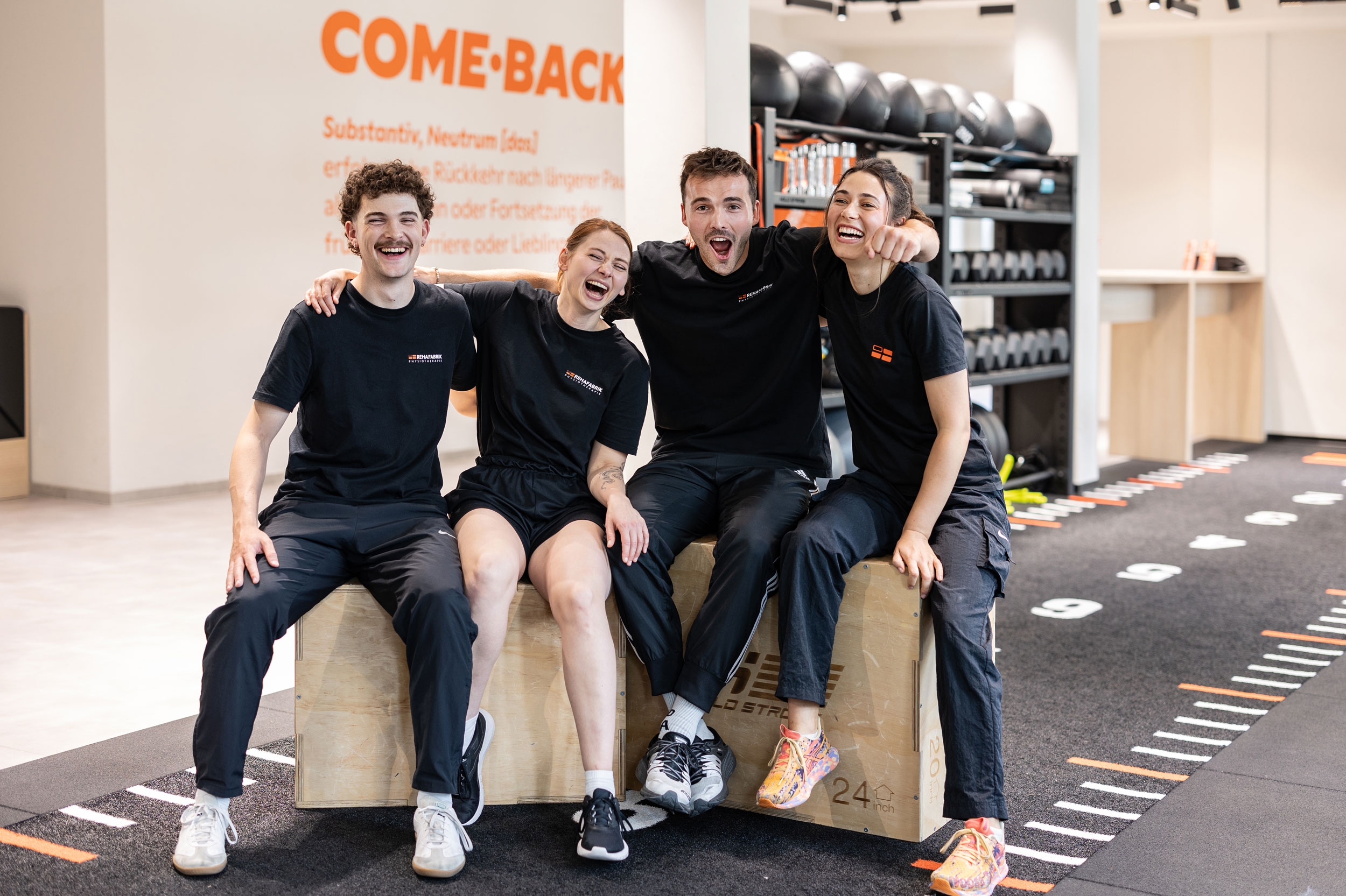 REHAFABRIK employees posing for a group photo in high spirits