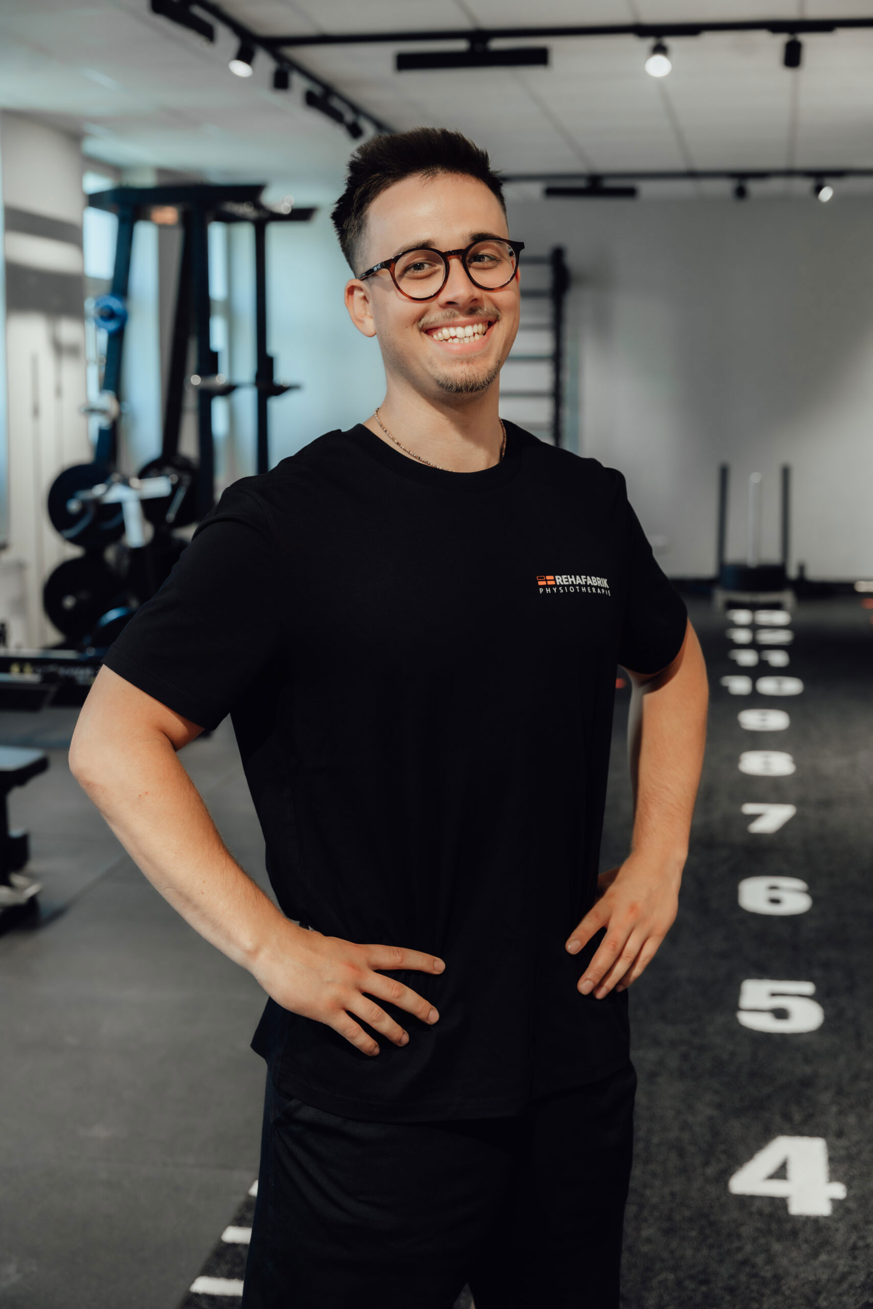 Smiling employee at REHAFABRIK