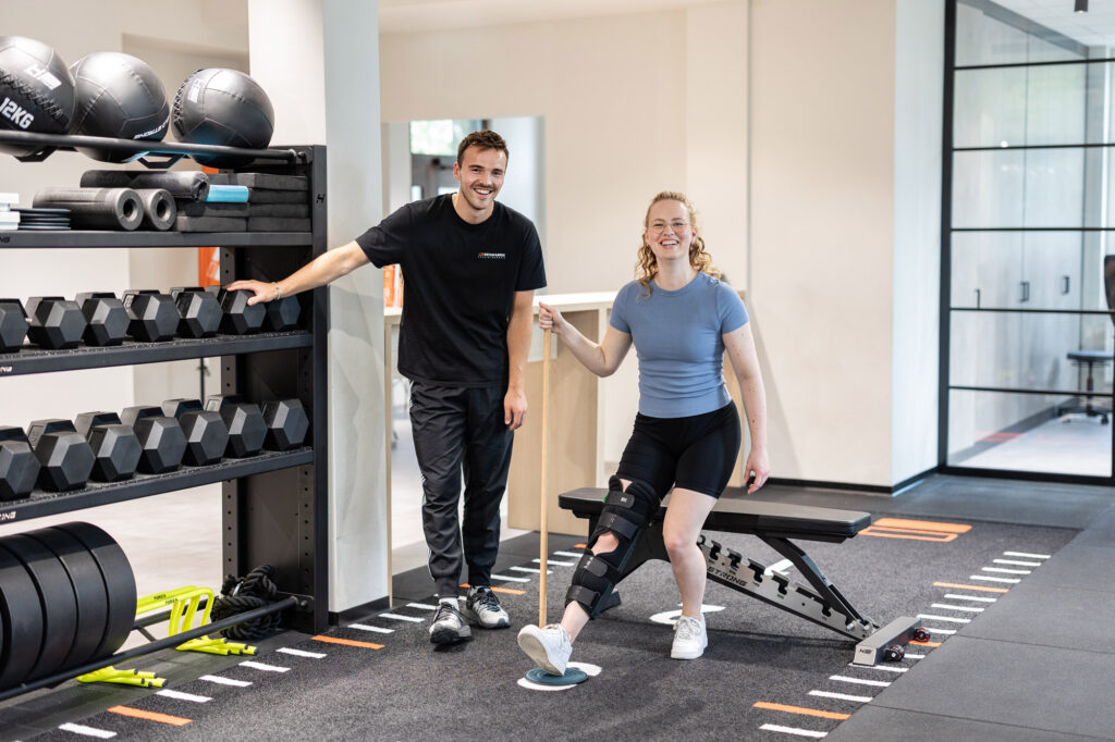 The physical therapist and the patient are in good spirits